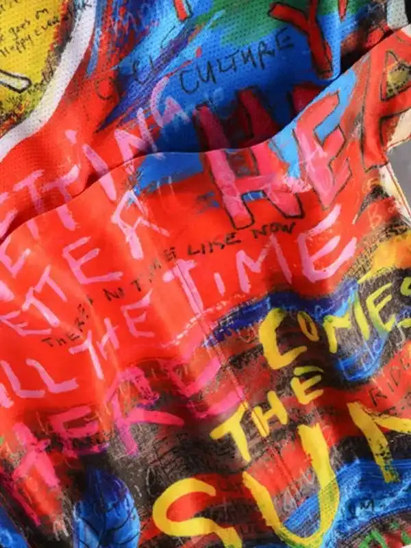 Vibrant graffiti-style cycling jersey with bold text print, perfect for men's and women's bike rides.