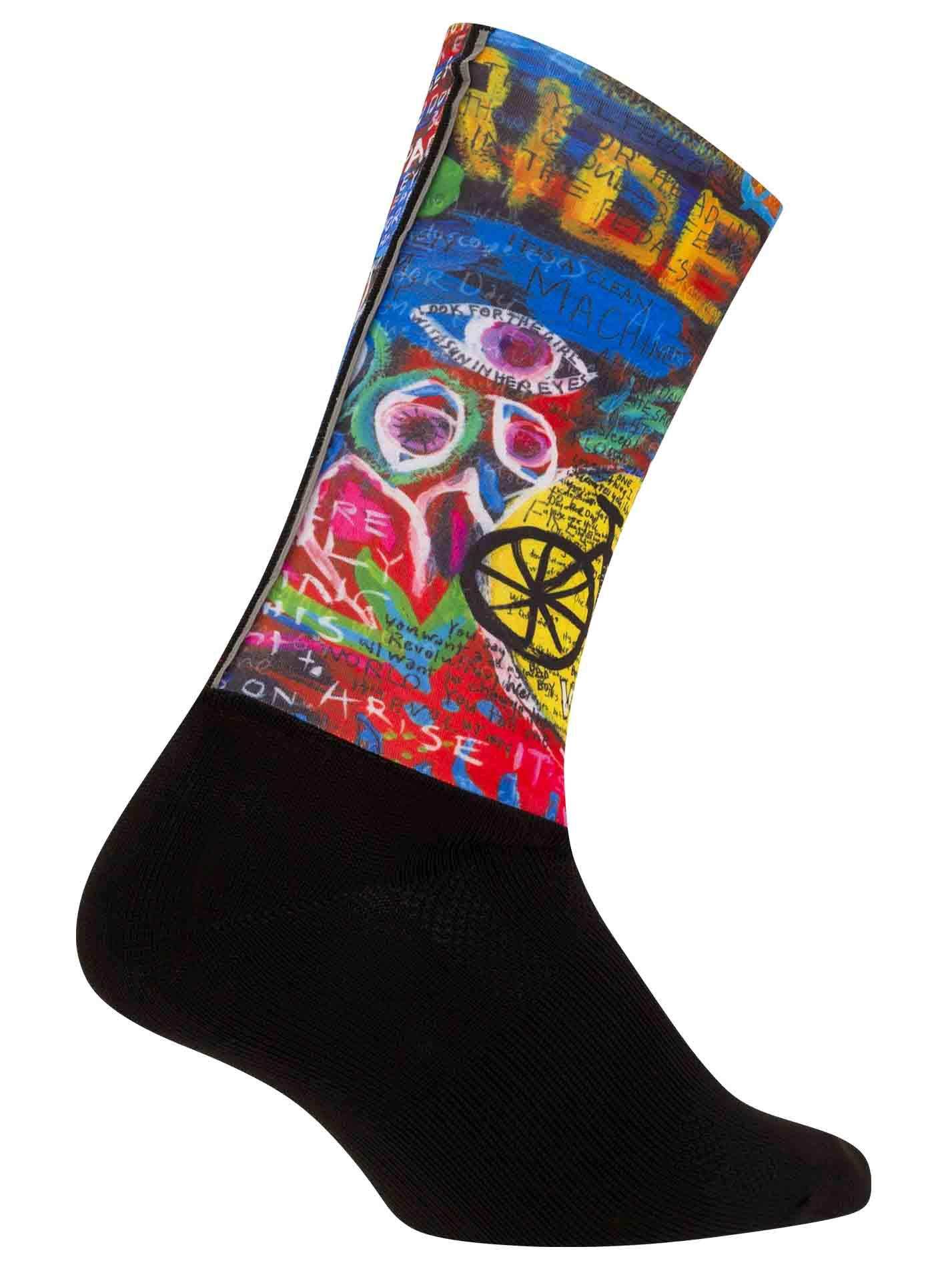 Colorful cycling socks with vibrant graffiti-style art, bold text, and bike wheel design on black base