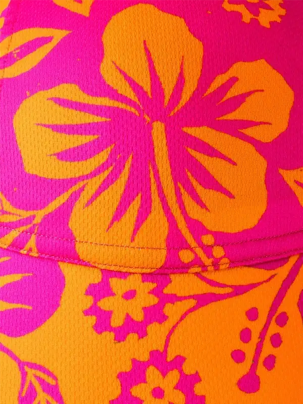 Vibrant pink and orange hibiscus floral print on cycling apparel fabric