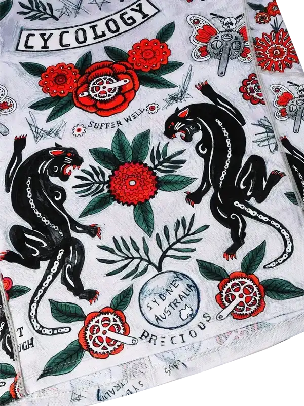 Cycling jersey with bold black panthers, red flowers, and gear designs for unique bike wear.