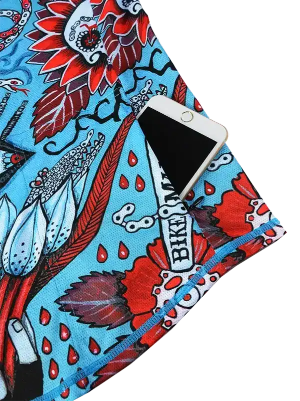 Colorful cycling jersey with floral and bike chain print, featuring phone pocket for riders