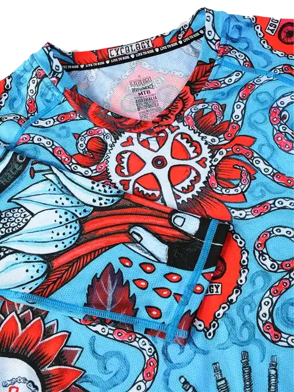 Men's cycling jersey with octopus and gear design, vibrant blue and red, performance fabric
