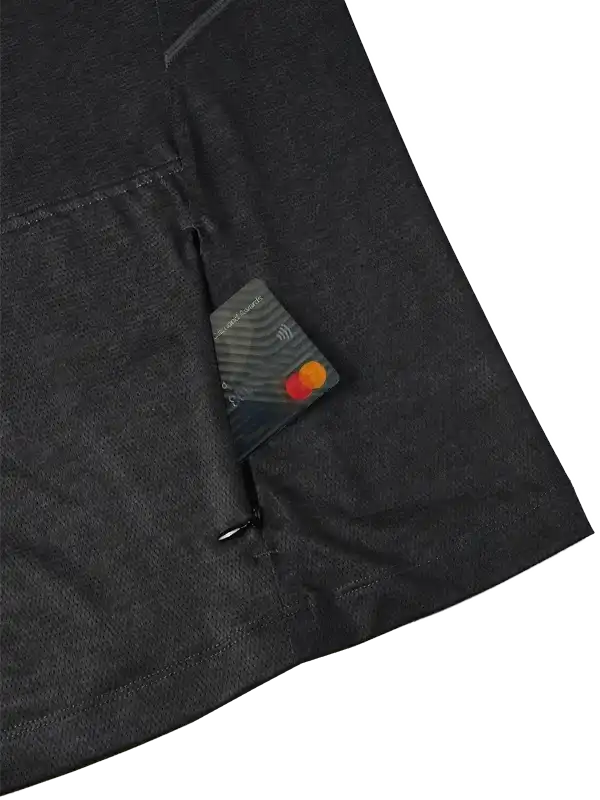 Black cycling jersey with secure zippered pocket holding credit card, ideal for rides
