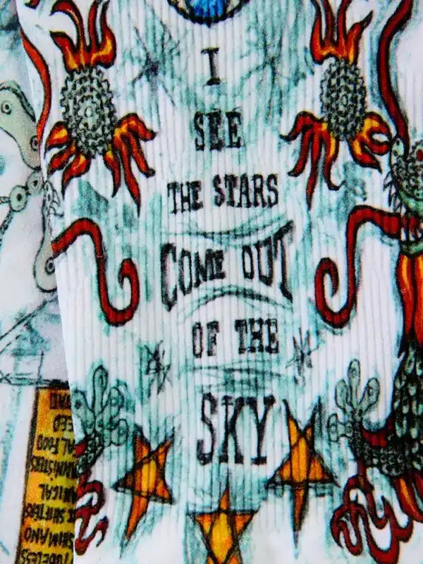 Cycling jersey with 'I see the stars come out of the sky' design, vibrant flames and stars