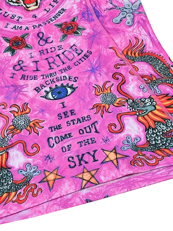 Pink long-sleeve cycling base layer with tiger design and colorful graphics and text