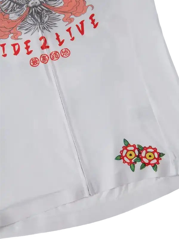 White cycling jersey with 'RIDE 2 LIVE' graphic, red floral embroidery, and bold design details