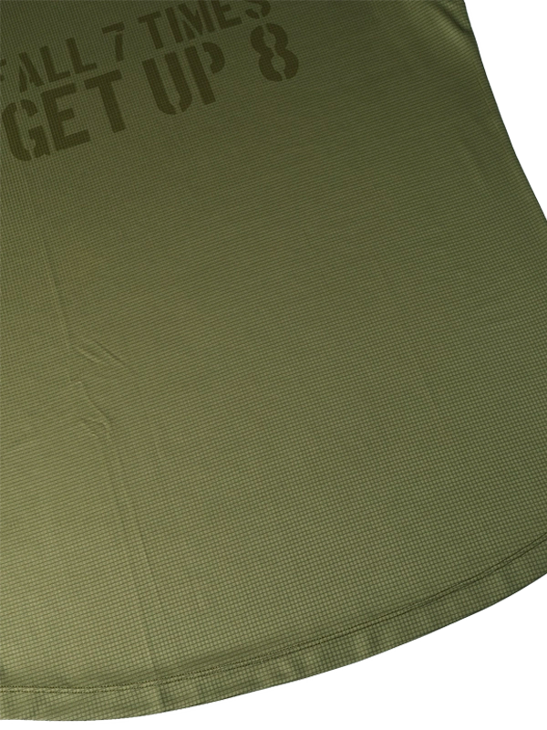 Green fabric with text 'All 7 Times Get Up 8' printed on it