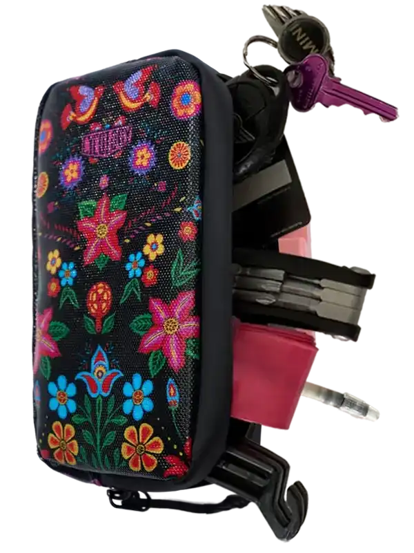 Colorful floral bike frame bag with keys and tools, ideal for cycling gear storage