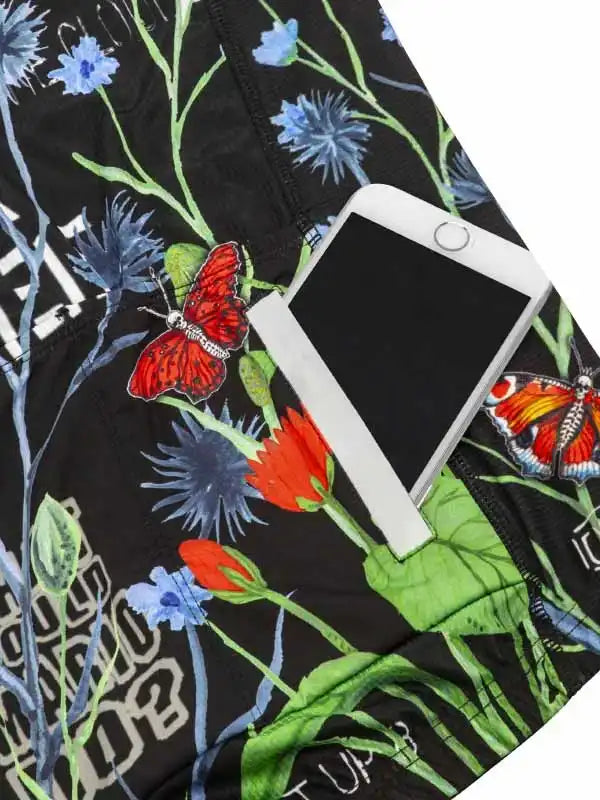 Black cycling shorts with floral and butterfly print, featuring phone pocket for on-the-go convenience.