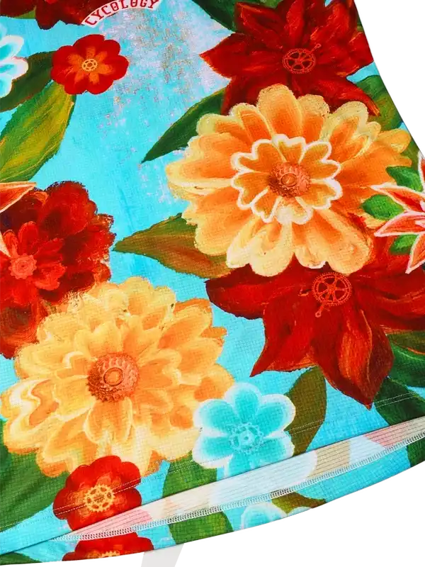 Vibrant floral cycling jersey with red, orange, and blue flowers on turquoise background