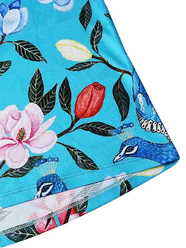 Blue cycling jersey with peacock and floral print, breathable fabric for women's bike wear