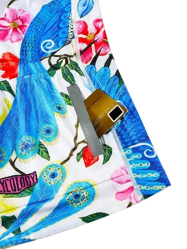 Cycling shorts with peacock feather and floral print, featuring secure zip pocket for cards