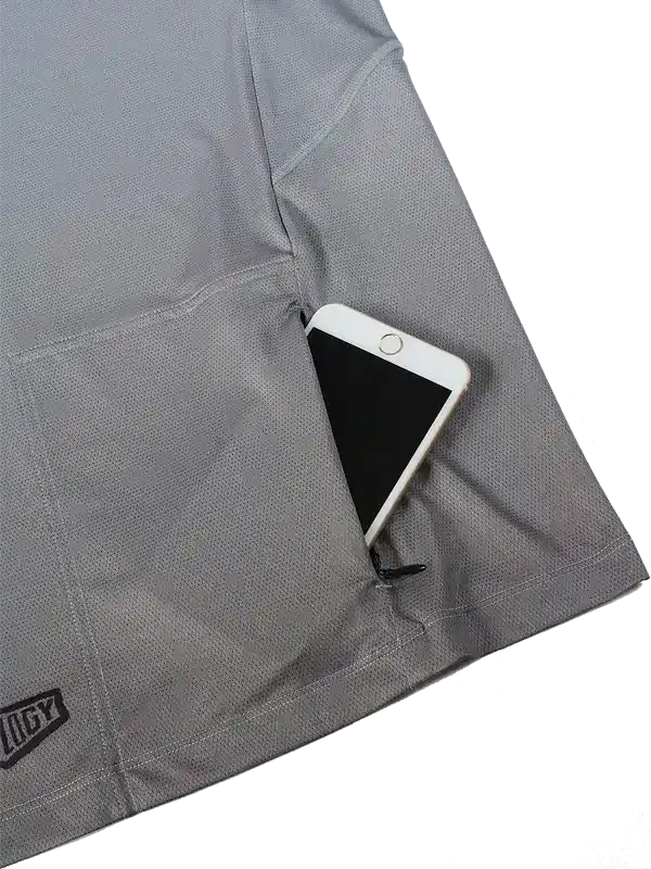 Gray cycling jersey pocket holding smartphone, ideal for men's and women's bike rides