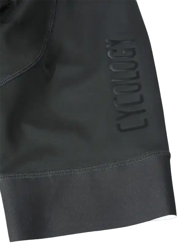 Black cycling shorts with embossed Cycology logo, high-quality fabric, seamless stitching