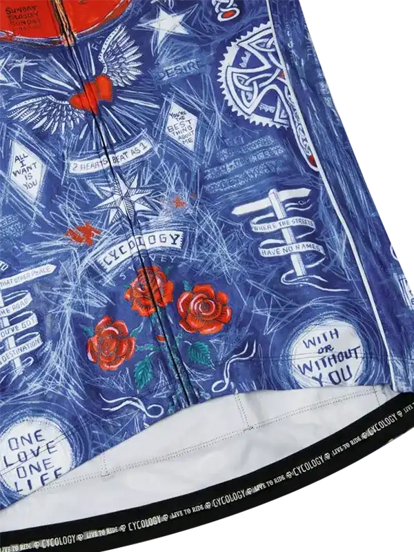 Blue cycling jersey with rose, wing, and quote graphics, featuring 'Cycology' branding on hem