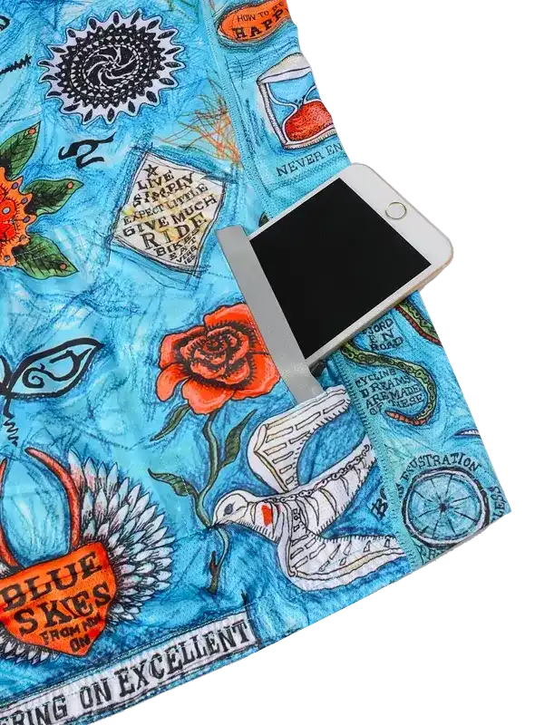 Blue cycling jersey with floral, bird, and quote graphics, phone in pocket