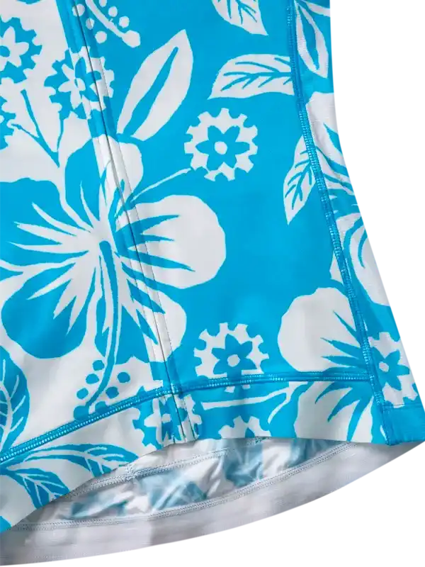 Blue and white floral cycling jersey with hibiscus print and gear accents, featuring performance fabric and tailored fit.