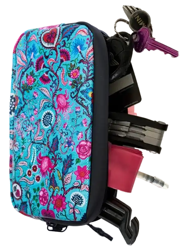 Floral-patterned bike seat bag with keys and tools, ideal for cycling storage