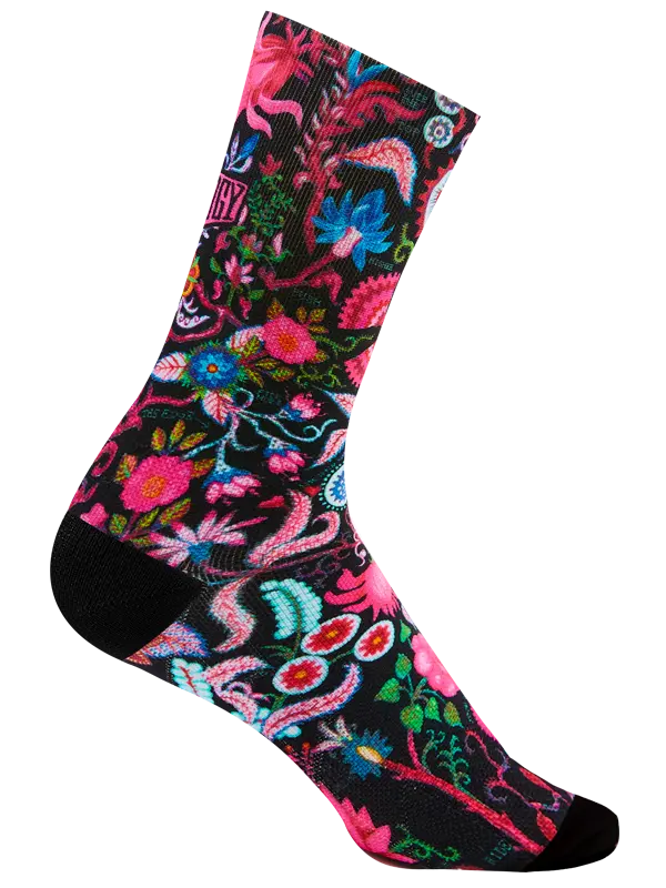 Floral cycling sock rear view with Cycology branding