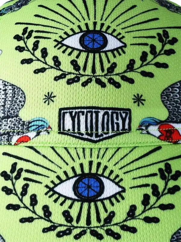Vibrant green cycling cap with bold eye and bird graphics, ideal for men's and women's bike rides.