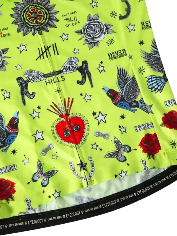Vibrant lime green cycling jersey with tattoo-style graphics, roses, birds, and stars for men and women riders.