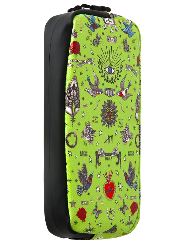 A bright lime green zippered cycling wallet featuring a detailed tattoo-style print with birds, roses, stars, and a central eye motif, shown against a plain white background.