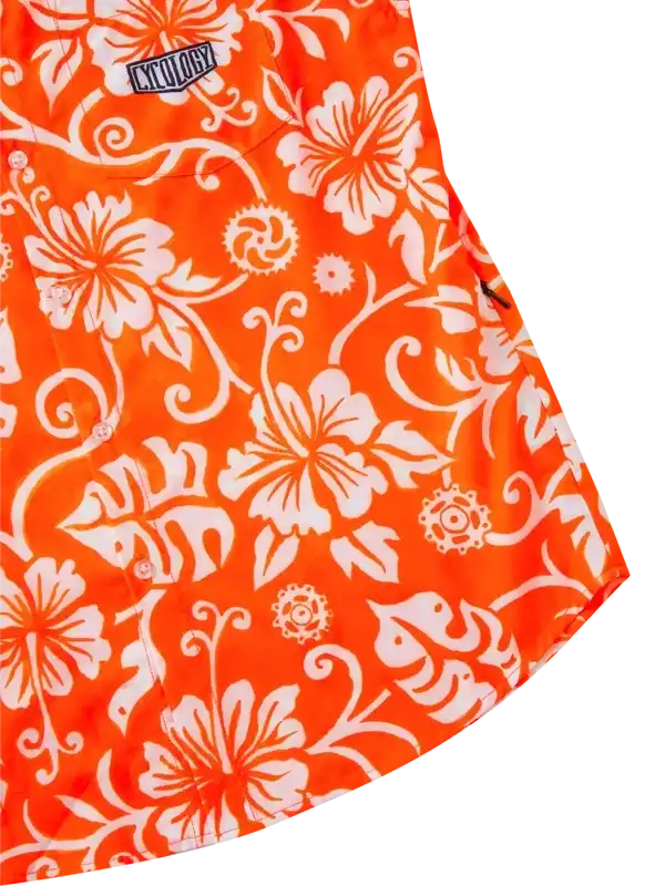 Vibrant orange cycling shirt with white hibiscus floral pattern and brand logo