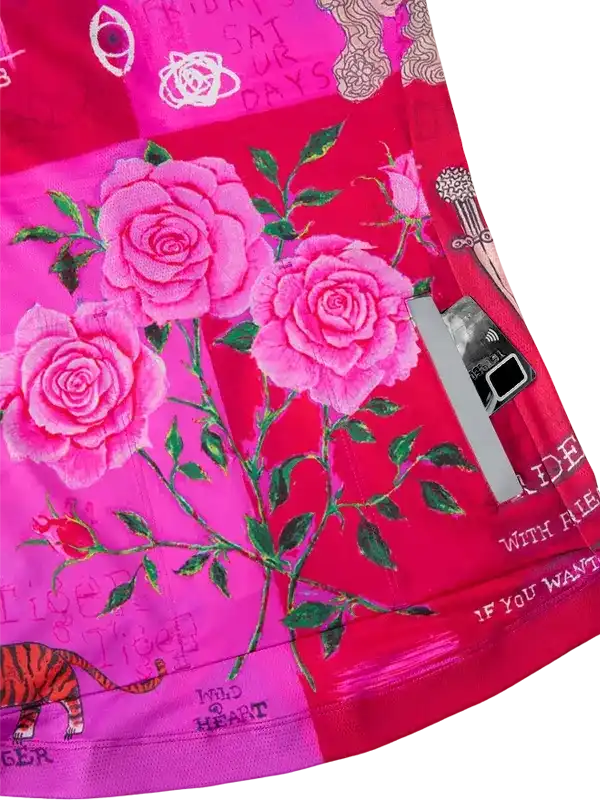 Vibrant pink cycling shorts with rose print, tiger graphic, and rear pocket for essentials