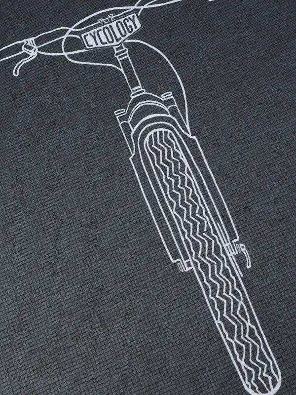 White line art of mountain bike front fork and tire on dark textured fabric, ideal for cycling apparel