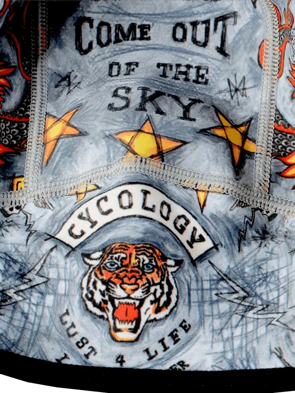 Cycling jersey with tiger graphic, stars, and 'Come Out of the Sky' text on light blue fabric