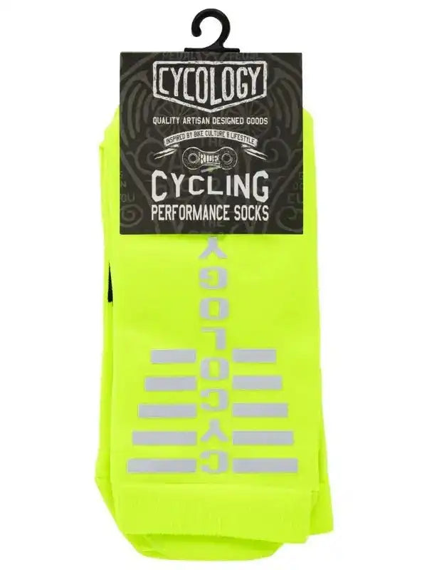 Bright neon yellow cycling performance socks with reflective stripes and brand tag