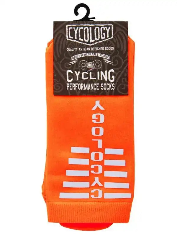 Bright orange cycling performance socks with bold white CYCOLOGY lettering, designed for bike culture and comfort.