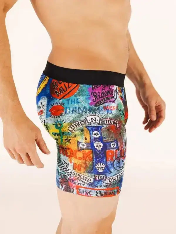 Men's colorful cycling shorts with bold graphic print and black waistband for active rides