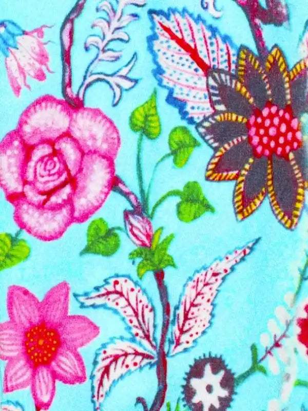 Vibrant floral pattern on cycling apparel fabric with pink roses and green leaves on blue background