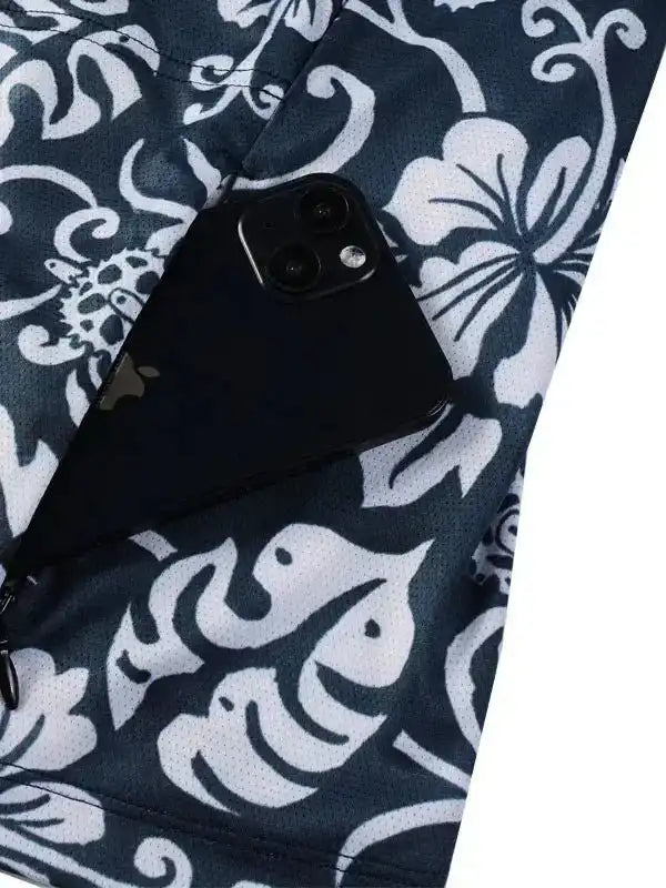 Cycling jersey pocket holding phone, floral print, breathable fabric, women's bike wear