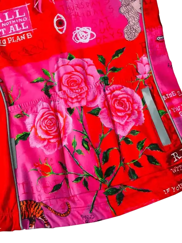 Vibrant red cycling jersey with pink roses, tiger print, and graphic text design for women's bike wear