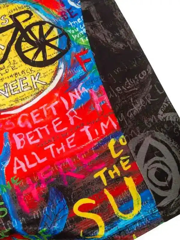 Colorful cycling jersey with bold graffiti art, bike graphic, and motivational text for men and women riders.