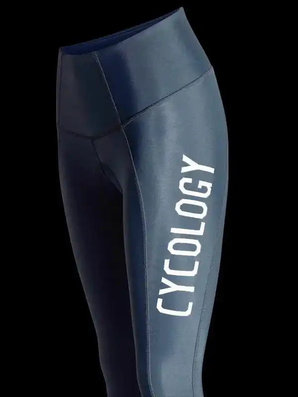 Women's cycling tights with 'CYCOLOGY' logo, high-waisted design, performance fabric for bike rides