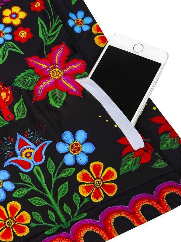 Black cycling shorts with vibrant floral embroidery and phone pocket, ideal for women's bike rides.