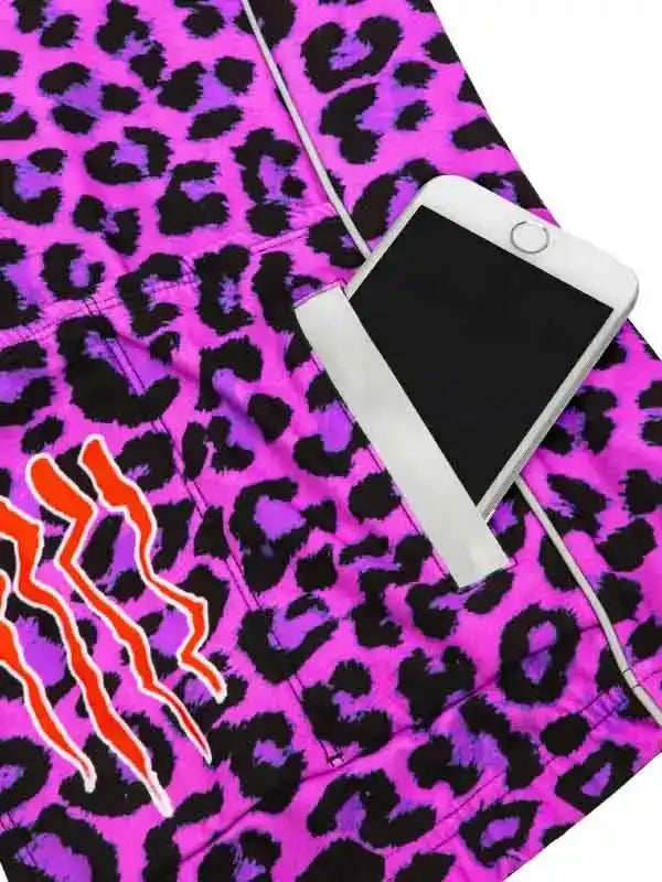Vibrant pink leopard print cycling shorts with orange claw design and phone pocket