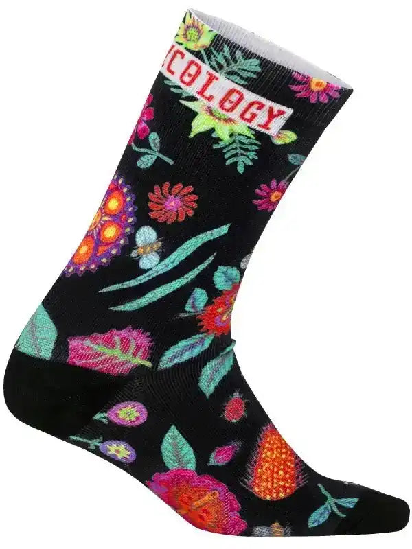 Black cycling sock with vibrant floral and butterfly print, featuring 'Cycology' logo on cuff