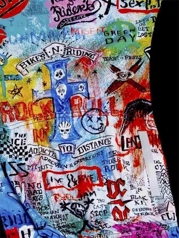 Vibrant rock-and-roll themed cycling jersey with graffiti-style graphics, skulls, and band names for men and women.