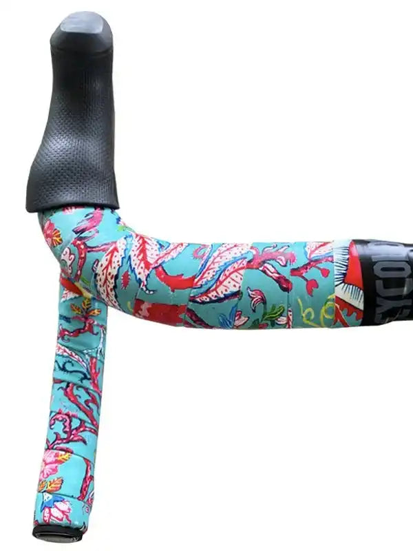 Colorful floral-patterned cycling handlebar tape with ergonomic grip, ideal for road bikes and comfort rides.