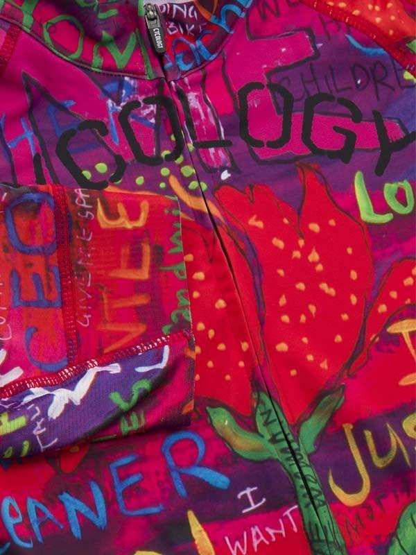 Vibrant graffiti-style cycling jersey with bold text and red tulip print, featuring front zipper and pocket.