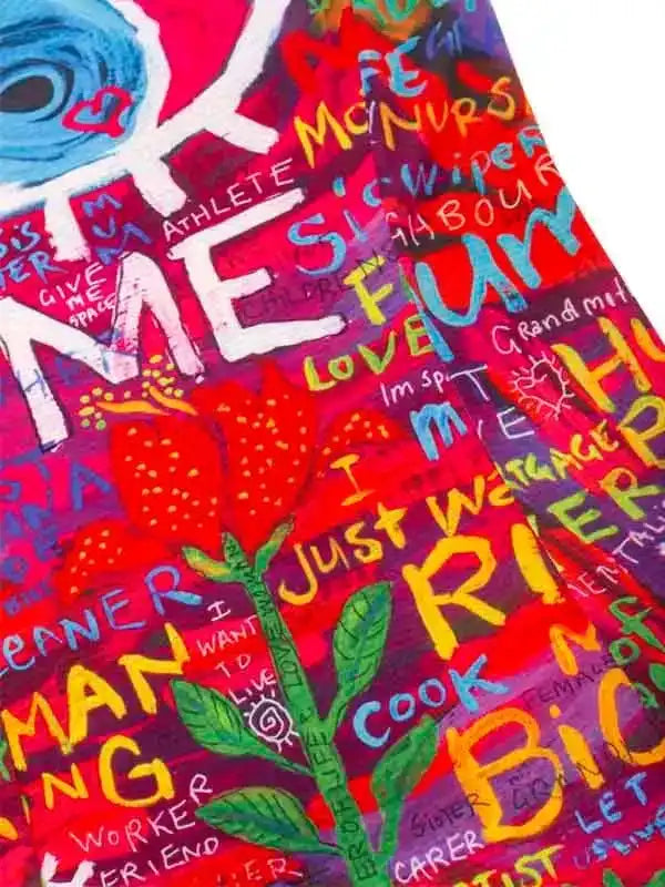 Vibrant cycling jersey with colorful graffiti-style text and floral design for men and women