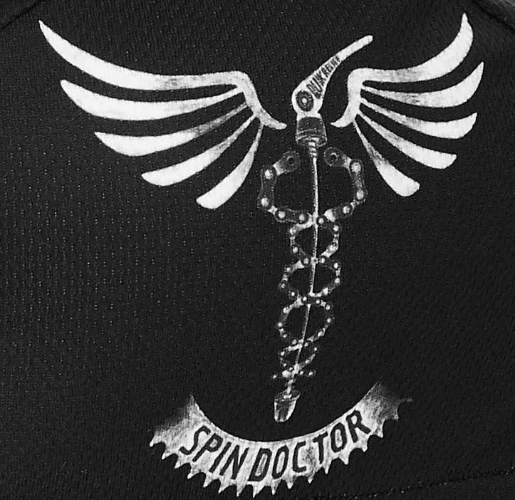 Black cycling jersey with white 'Spin Doctor' graphic, wings, and chain design