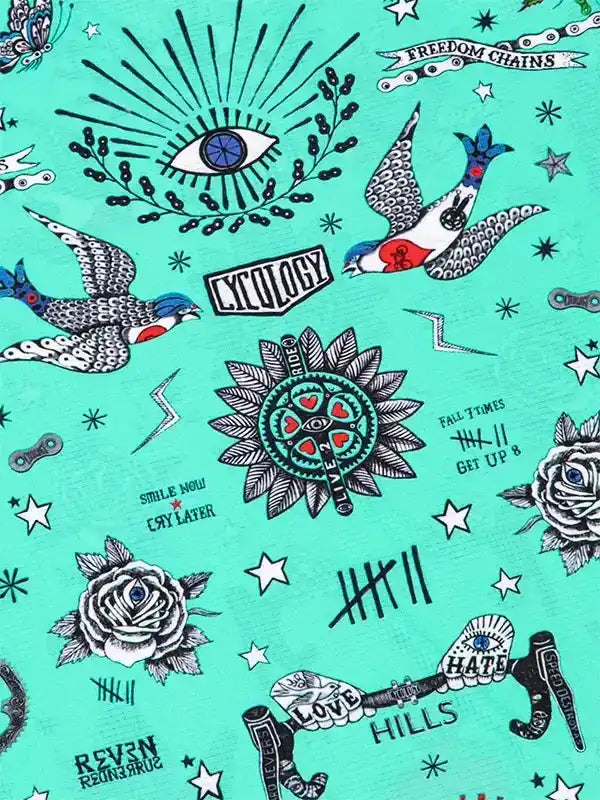 Cycology cycling apparel fabric with tattoo-style birds, roses, and eye designs on teal background