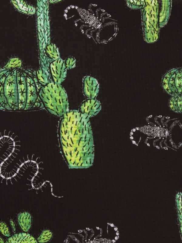 Cactus and scorpion print cycling fabric, desert-themed design for bike apparel