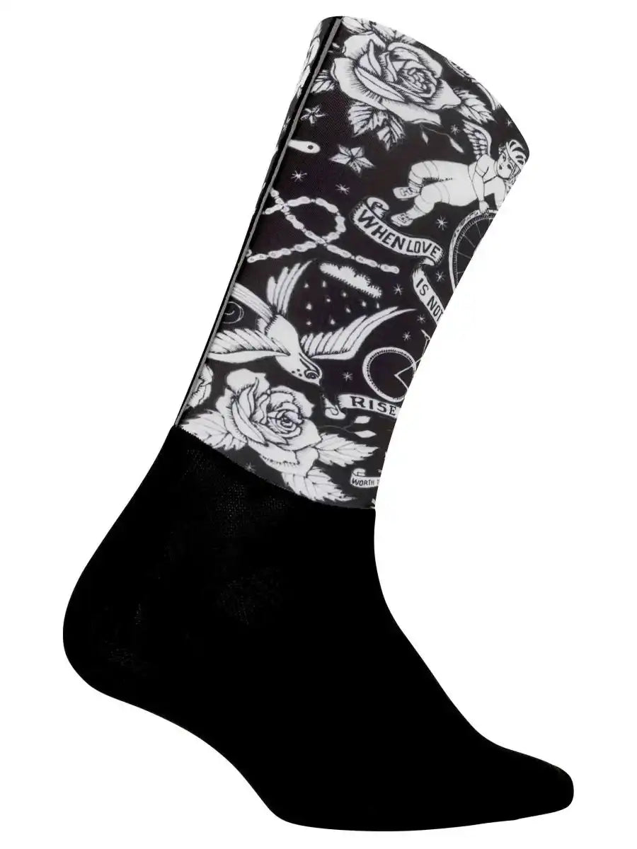 Black cycling sock with white rose, bird, and tattoo-style graphics for men and women