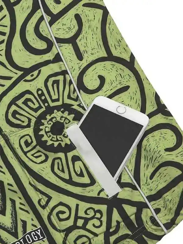 Green cycling shorts with black abstract print and phone pocket, ideal for men's and women's bike rides